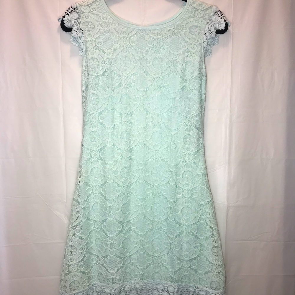 👗Light blue lace dress.